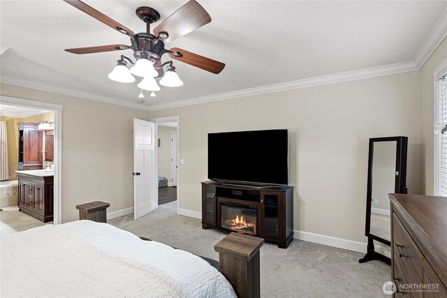 4565 Harper Hill Rd SE, Port Orchard, WA 98366 - bedroom featuring ornamental molding, light colored carpet, a glass covered fireplace, ceiling fan, and ensuite bath