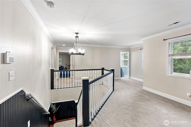 4565 Harper Hill Rd SE, Port Orchard, WA 98366 - corridor with an upstairs landing, a chandelier, ornamental molding, healthy amount of natural light, and carpet flooring