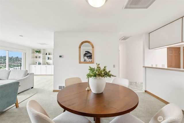 2040 13th Ave W Unit 41, Seattle, WA 98119 - dining area with light carpet and baseboards
