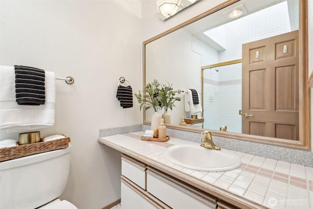 2040 13th Ave W Unit 41, Seattle, WA 98119 - bathroom featuring vanity, a stall shower, and toilet