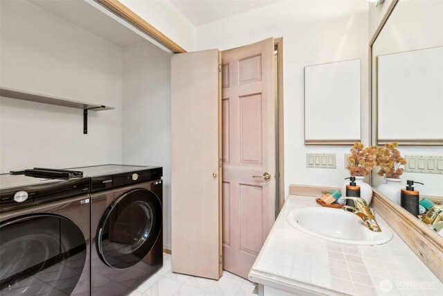 2040 13th Ave W Unit 41, Seattle, WA 98119 - washroom with washer and clothes dryer