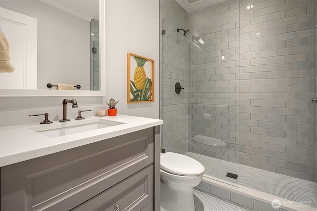 3719 E Highland Dr, Seattle, WA 98112 - bathroom featuring tiled shower, toilet, and vanity