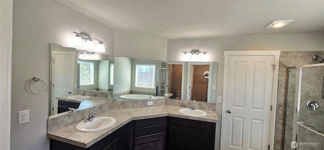 2826 Anna St NE, Lacey, WA 98502 - full bathroom featuring a shower stall, double vanity, a garden tub, and toilet