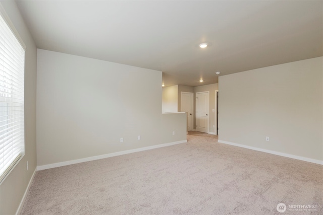 8507 13th Ave E, Tacoma, WA 98445 - unfurnished room featuring light carpet, baseboards, and recessed lighting