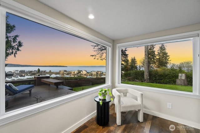 10220 NE Lafayette Ave, Bainbridge Island, WA 98110 - sunroom with baseboards, wood finished floors, a water view, and recessed lighting