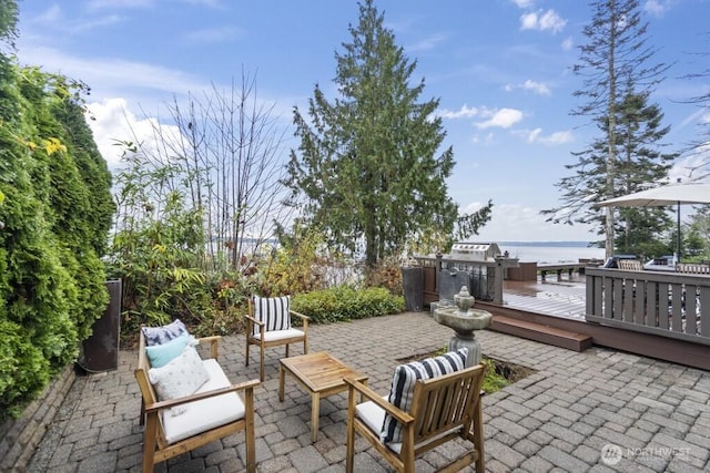 10220 NE Lafayette Ave, Bainbridge Island, WA 98110 - view of patio / terrace with a deck with water view