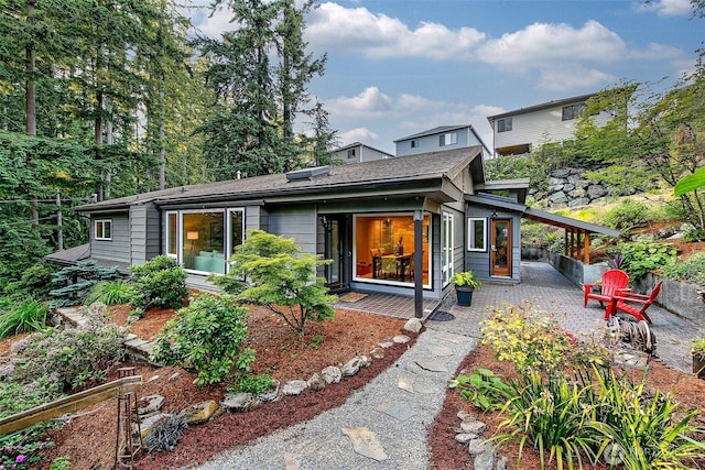 18527 Butternut Rd, Lynnwood, WA 98037 - rear view of house with a patio area