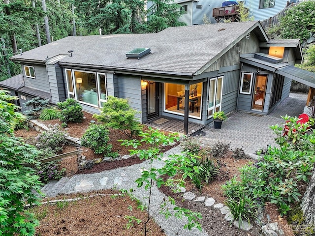 18527 Butternut Rd, Lynnwood, WA 98037 - back of property with a shingled roof