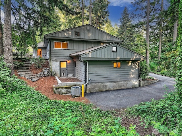 18527 Butternut Rd, Lynnwood, WA 98037 - rear view of property with view of scattered trees