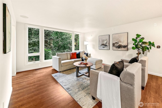 18527 Butternut Rd, Lynnwood, WA 98037 - living room with healthy amount of natural light and wood finished floors