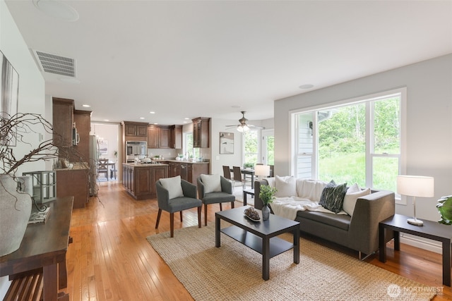 3831 171st Ave SE, Snohomish, WA 98290 - living area with ceiling fan, light wood-type flooring, and recessed lighting