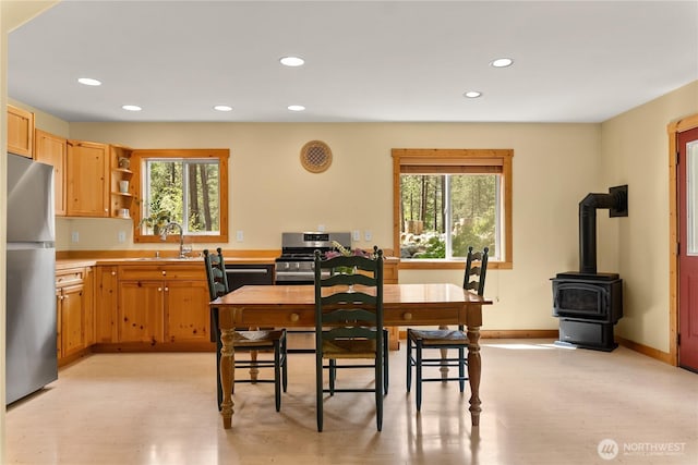 18 Deer Run Loop Rd, Winthrop, WA 98862 - dining space featuring recessed lighting, a wood stove, and baseboards