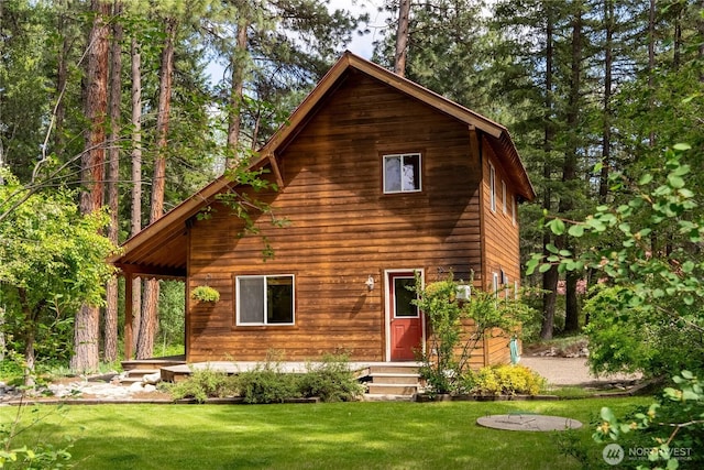 18 Deer Run Loop Rd, Winthrop, WA 98862 - rear view of property featuring a yard and entry steps