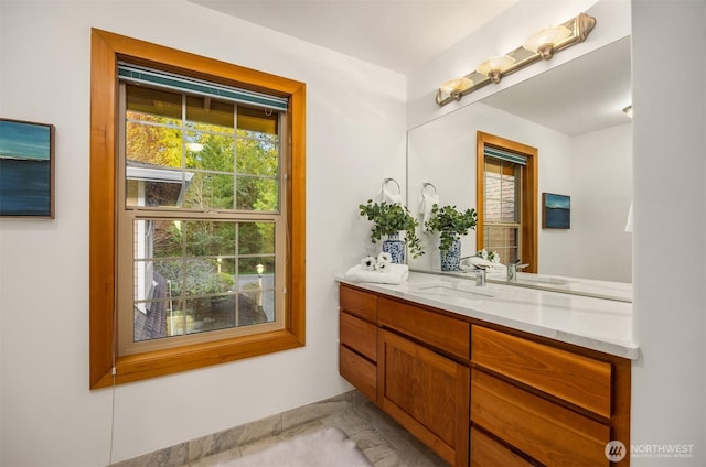 3969 Palomino Dr NE, Bainbridge Island, WA 98110 - bathroom featuring plenty of natural light, vanity, and baseboards