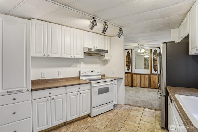 10132 228th Pl SE, Woodinville, WA 98077 - kitchen featuring white range with electric cooktop, under cabinet range hood, light carpet, a ceiling fan, and dark countertops
