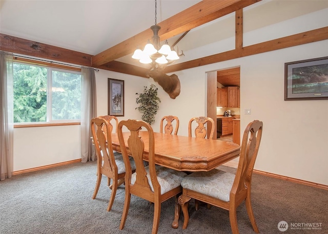 5707 316th St NW, Stanwood, WA 98292 - dining space featuring a chandelier, light carpet, and baseboards