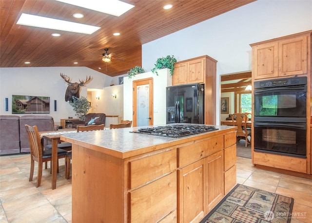 5707 316th St NW, Stanwood, WA 98292 - kitchen with black appliances, a center island, lofted ceiling, wooden ceiling, and recessed lighting