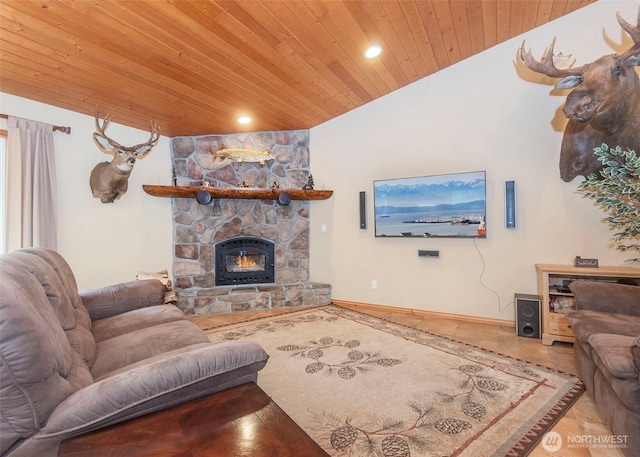 5707 316th St NW, Stanwood, WA 98292 - living area featuring wood ceiling, a stone fireplace, recessed lighting, and lofted ceiling