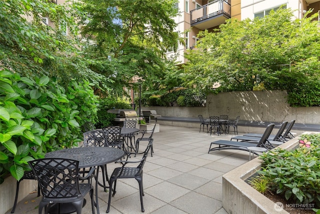 5450 Leary Ave NW Unit 442, Seattle, WA 98107 - view of patio featuring grilling area and outdoor dining area