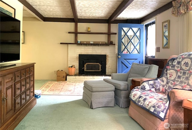 419 Draconis Ave SE, Ocean Shores, WA 98569 - carpeted living area with beamed ceiling and a brick fireplace