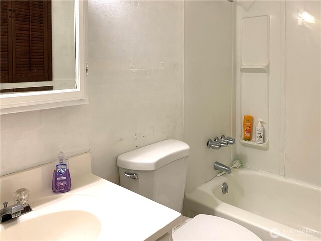 419 Draconis Ave SE, Ocean Shores, WA 98569 - full bathroom with toilet, vanity, and washtub / shower combination
