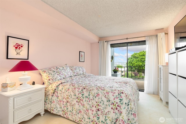 3661 24th Pl W Unit 104, Seattle, WA 98199 - bedroom with light colored carpet, access to outside, and a textured ceiling