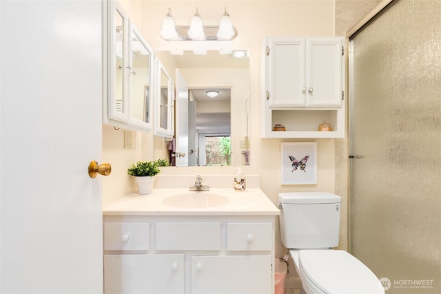 3661 24th Pl W Unit 104, Seattle, WA 98199 - full bath featuring vanity, toilet, and a shower with shower door