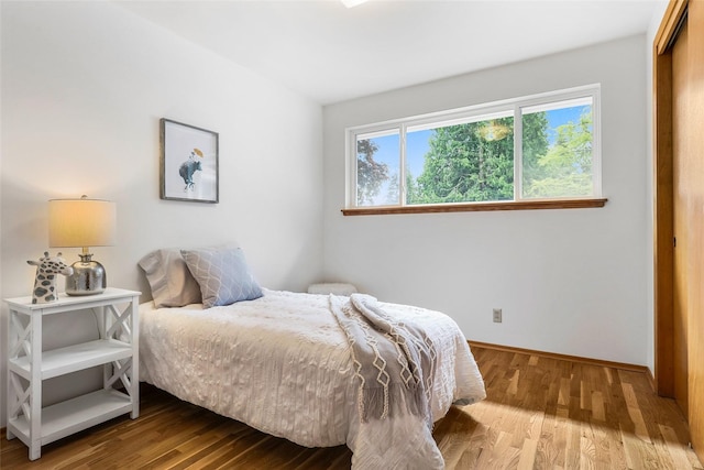 20010 3rd Ave NW, Shoreline, WA 98177 - bedroom featuring wood finished floors, baseboards, and a closet