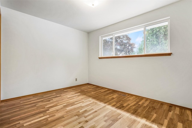 20010 3rd Ave NW, Shoreline, WA 98177 - unfurnished room featuring wood finished floors