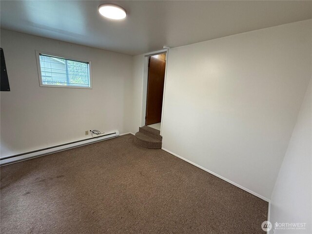 1601 E Maryland St, Bellingham, WA 98226 - carpeted spare room featuring a baseboard heating unit and baseboards