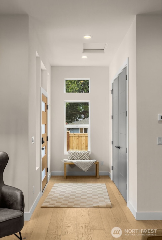 2727 50th Ave SW, Seattle, WA 98116 - hallway featuring light wood-type flooring, attic access, baseboards, and recessed lighting