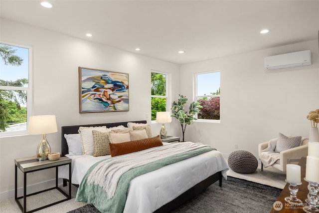 2727 50th Ave SW, Seattle, WA 98116 - bedroom with a wall mounted AC, recessed lighting, and baseboards