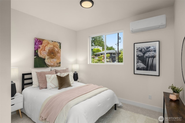 2727 50th Ave SW, Seattle, WA 98116 - bedroom featuring a wall mounted air conditioner, carpet floors, and baseboards