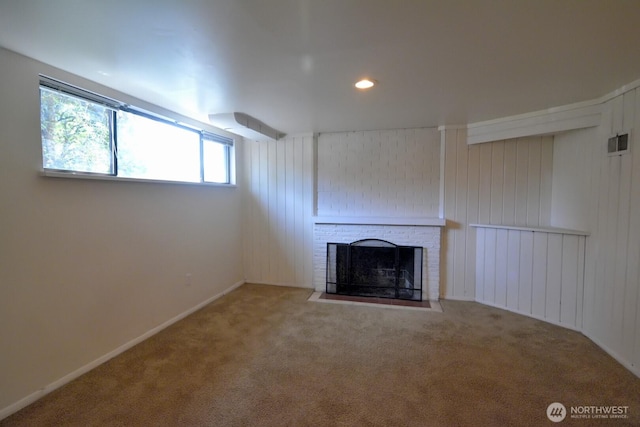 2116 N 86th St, Seattle, WA 98103 - unfurnished living room with carpet floors, a brick fireplace, and recessed lighting