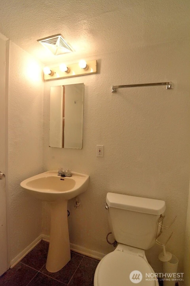 2116 N 86th St, Seattle, WA 98103 - half bath featuring tile patterned floors and toilet
