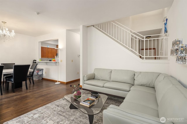 18526 36th Ave W Unit C, Lynnwood, WA 98037 - living area with dark wood-style flooring, stairs, a chandelier, and baseboards