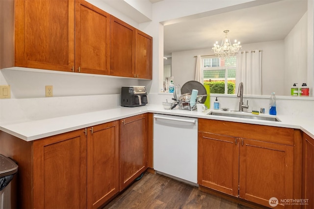 18526 36th Ave W Unit C, Lynnwood, WA 98037 - kitchen featuring white dishwasher, a sink, dark wood finished floors, and light countertops