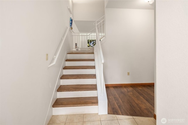 18526 36th Ave W Unit C, Lynnwood, WA 98037 - staircase featuring tile patterned flooring and baseboards