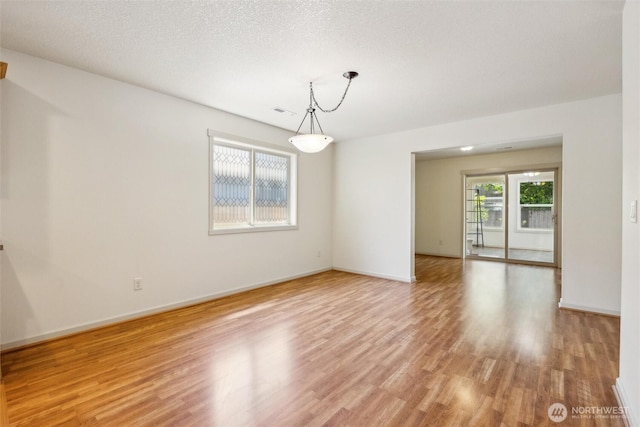 301 SE 4th Ave, Battle Ground, WA 98604 - unfurnished room featuring light wood-type flooring and baseboards