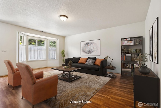 301 SE 4th Ave, Battle Ground, WA 98604 - living area with wood finished floors and a textured ceiling