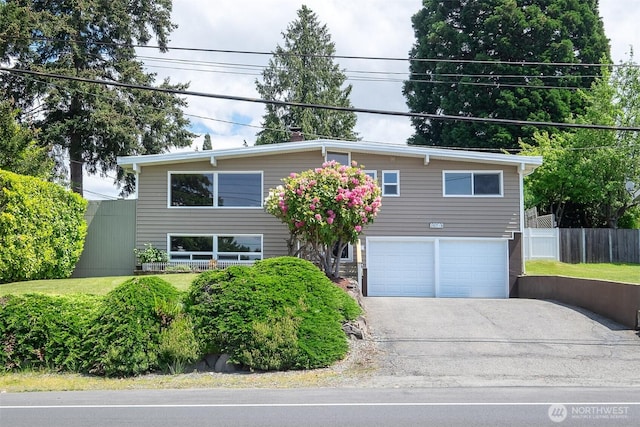 25718 16th Ave S, Des Moines, WA 98198 - view of front of home with an attached garage and asphalt driveway