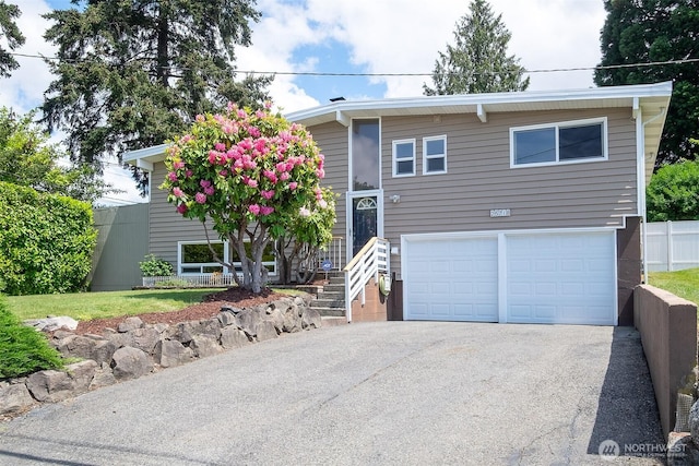 25718 16th Ave S, Des Moines, WA 98198 - view of front of home featuring driveway and an attached garage