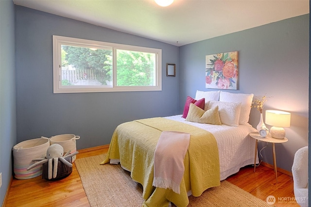 25718 16th Ave S, Des Moines, WA 98198 - bedroom featuring wood finished floors and baseboards