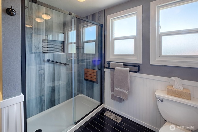 25718 16th Ave S, Des Moines, WA 98198 - bathroom with toilet, a stall shower, and wainscoting