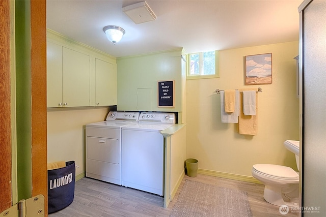 25718 16th Ave S, Des Moines, WA 98198 - laundry room with independent washer and dryer, light wood-type flooring, and baseboards