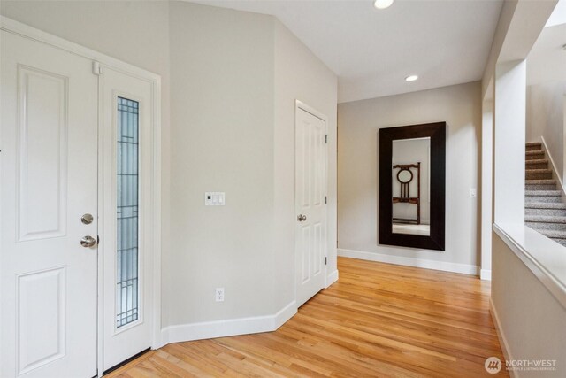 27309 SE 10th Ct, Sammamish, WA 98075 - entryway with light wood-style flooring, baseboards, stairs, and recessed lighting
