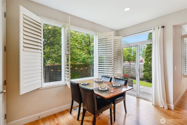 27309 SE 10th Ct, Sammamish, WA 98075 - dining space with baseboards, wood finished floors, and recessed lighting
