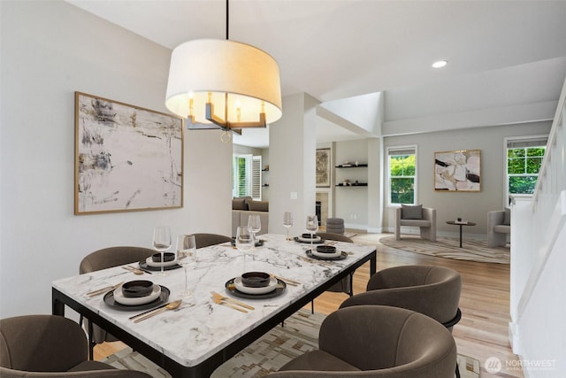 27309 SE 10th Ct, Sammamish, WA 98075 - dining area featuring light wood finished floors, baseboards, a chandelier, and recessed lighting