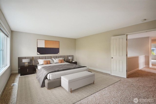 27309 SE 10th Ct, Sammamish, WA 98075 - carpeted bedroom featuring multiple windows and baseboards