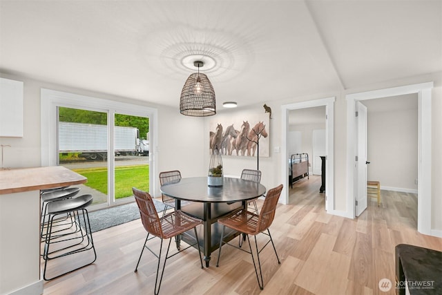 1005 Johnson St, Sumas, WA 98295 - dining space with light wood-style flooring and baseboards